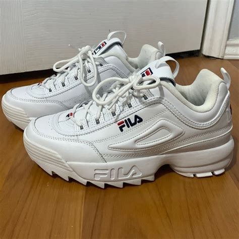 white chunky fila shoes.